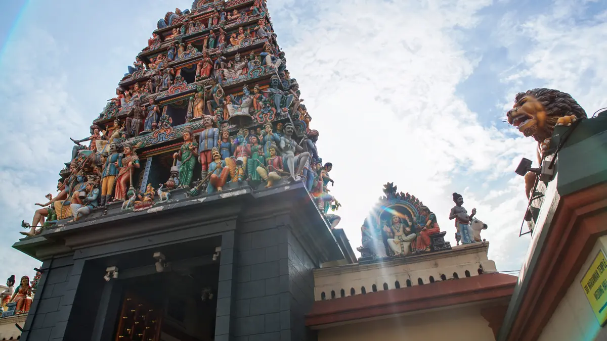 Chinatown — The gopuram of Sri Mariamman Temple in Chinatown, densely covered in brightly painted Hindu deity statues