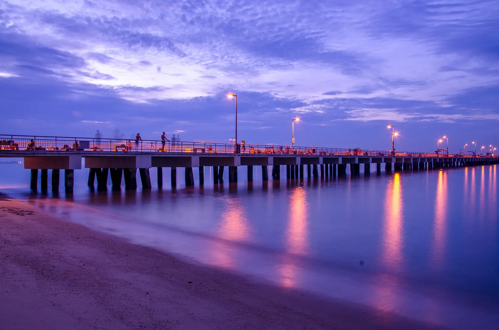 Anglers on Bedok Jetty at East Coast Park, Singapore