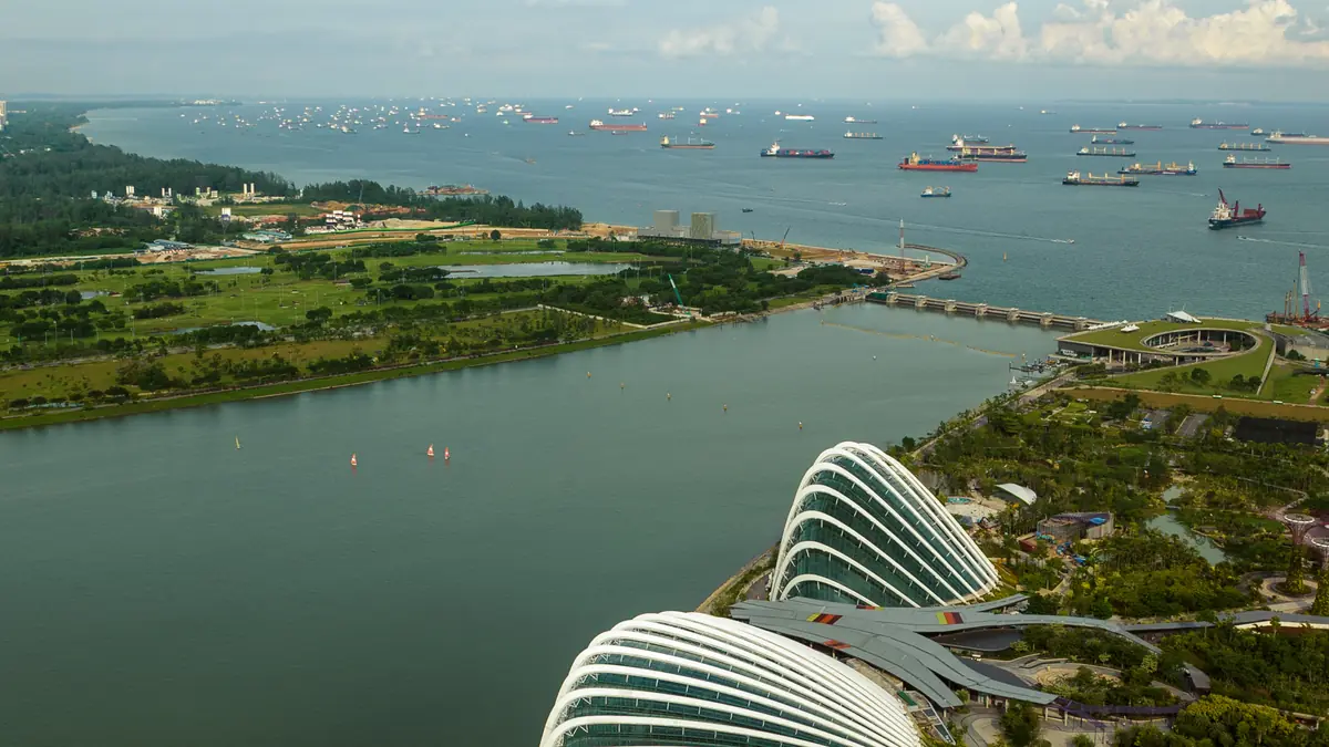 Gardens by the Bay — Aerial view of the Flower Dome and Cloud Forest glass conservatories at Gardens by the Bay beside the water