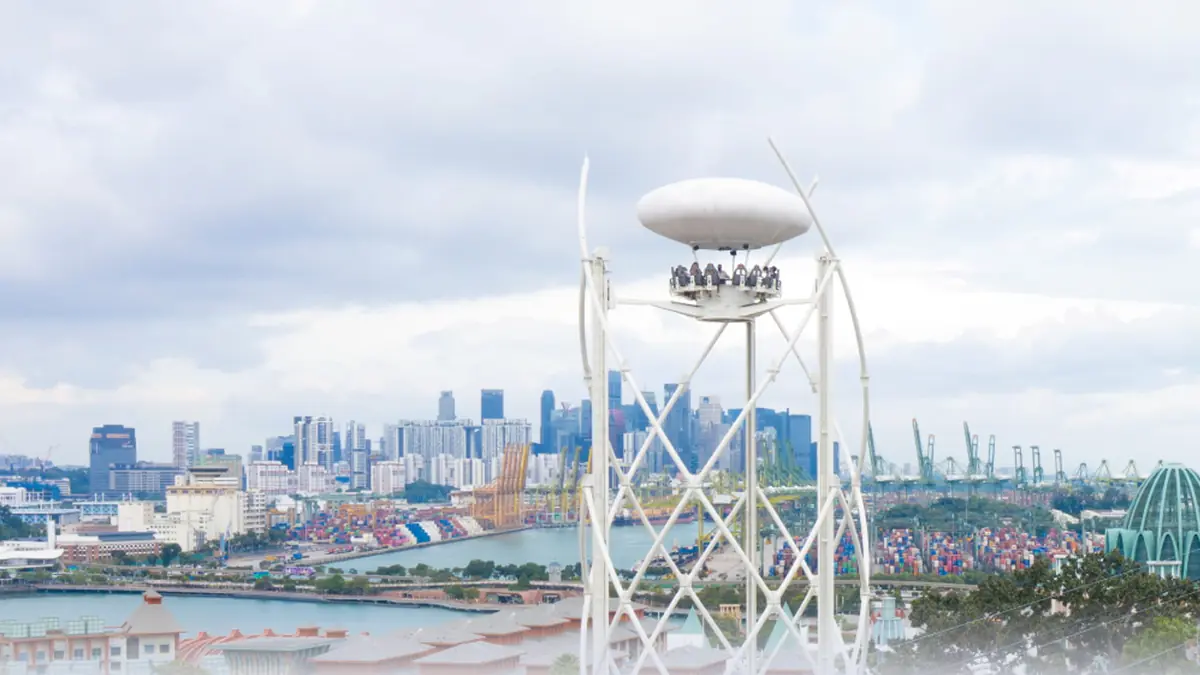 SkyHelix Sentosa — The SkyHelix Sentosa open-air gondola rising above Sentosa with panoramic views over the island and sea