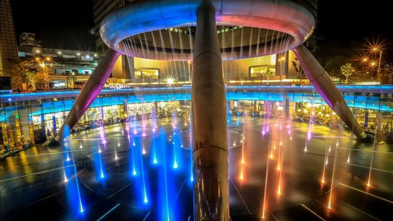 The bronze ring of the Fountain of Wealth at Suntec City, Singapore, during a touch water session