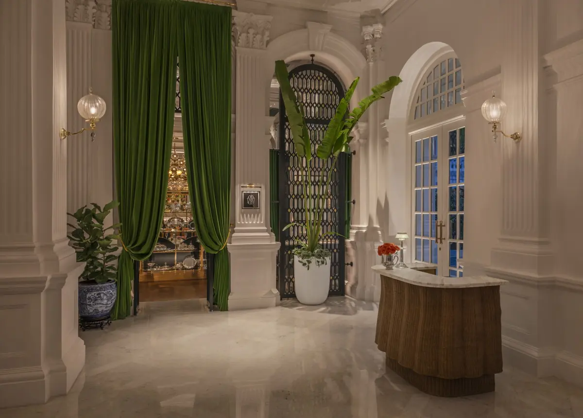 Entrance to 1887 by Andre at twilight, Raffles Hotel Singapore