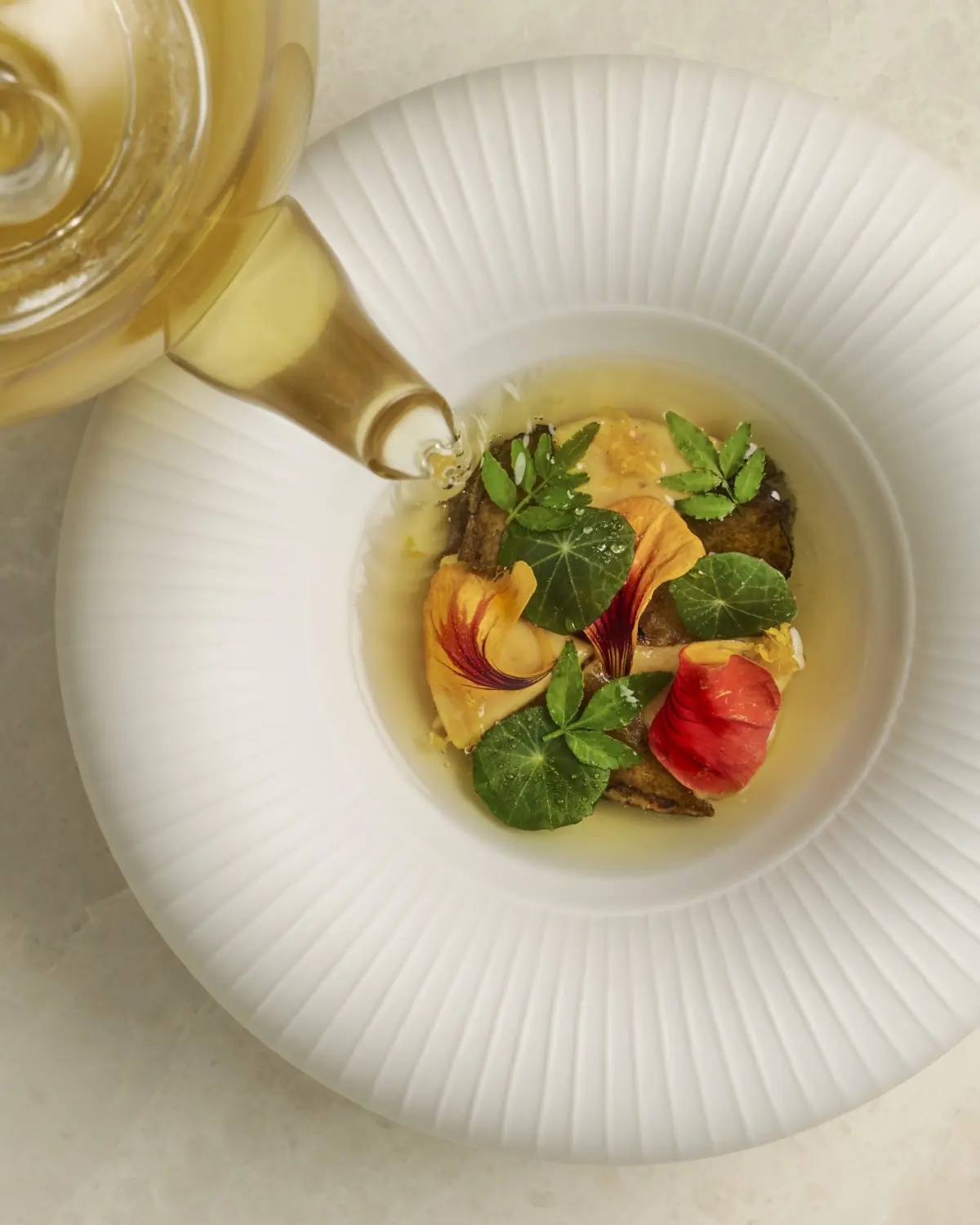 Jeju abalone and foie gras dish with nasturtium at Odette, Singapore