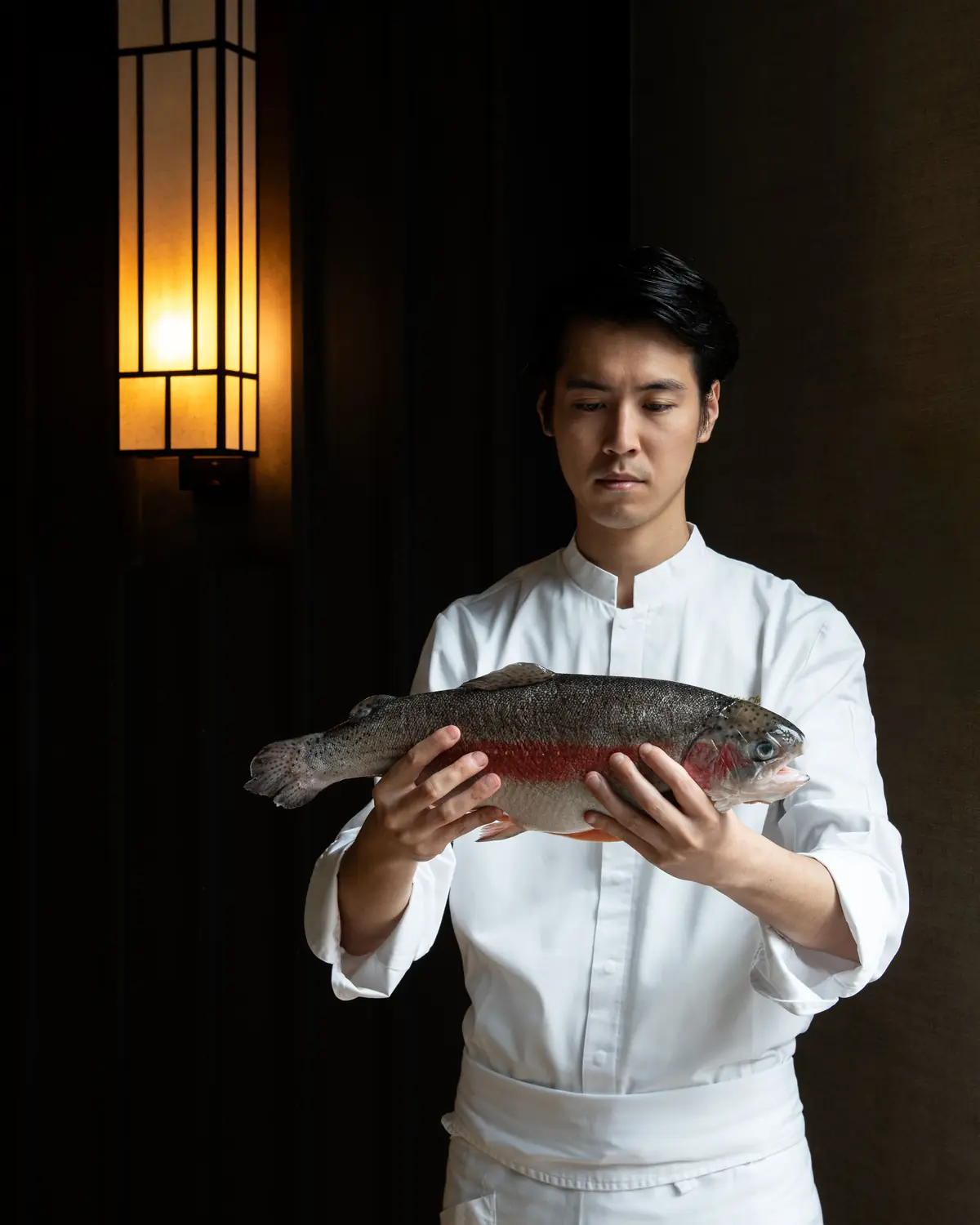 The chef with a whole trout at Omakase @ Stevens, Singapore