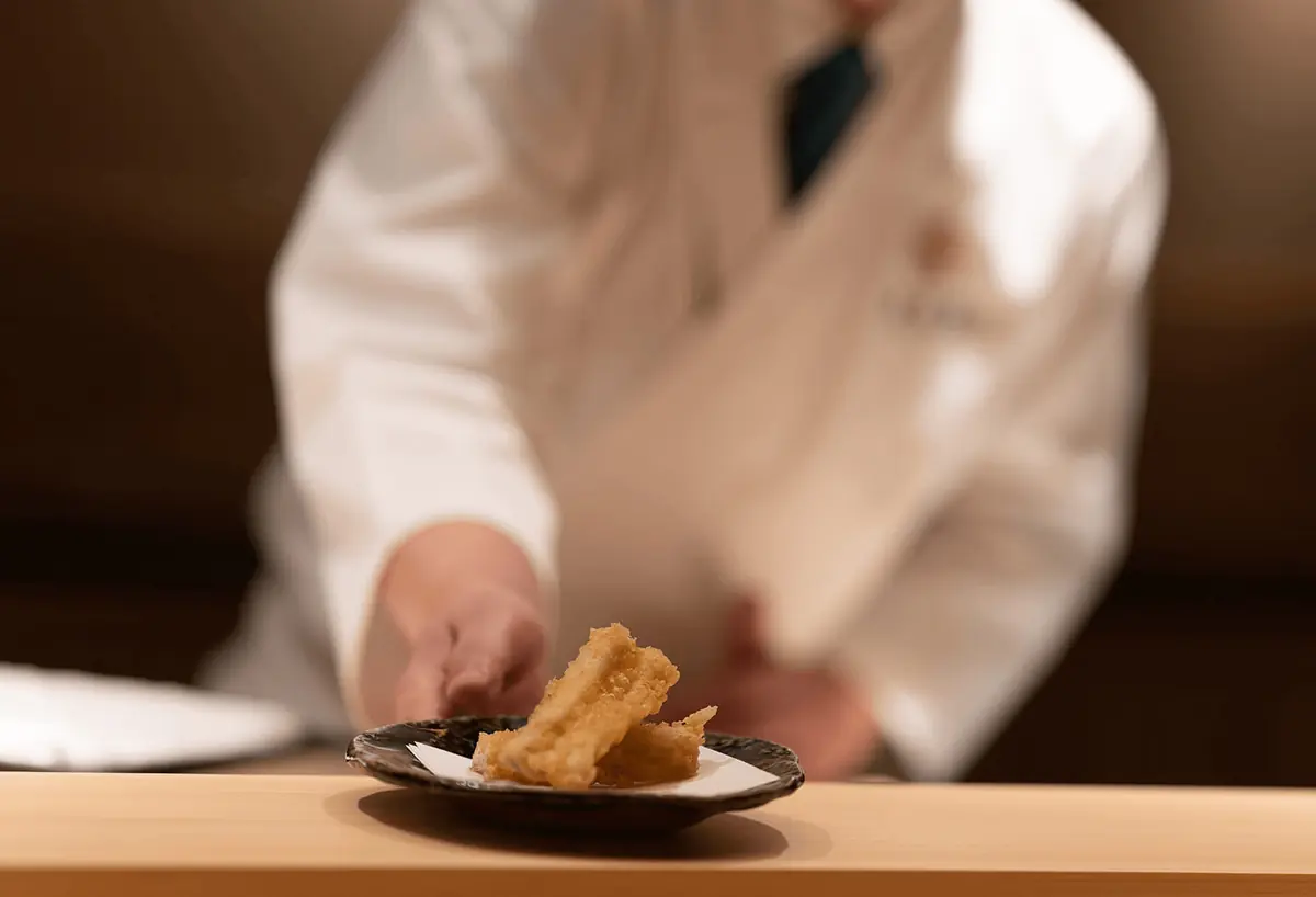Tempura being fried at the counter of Tenshima, Singapore