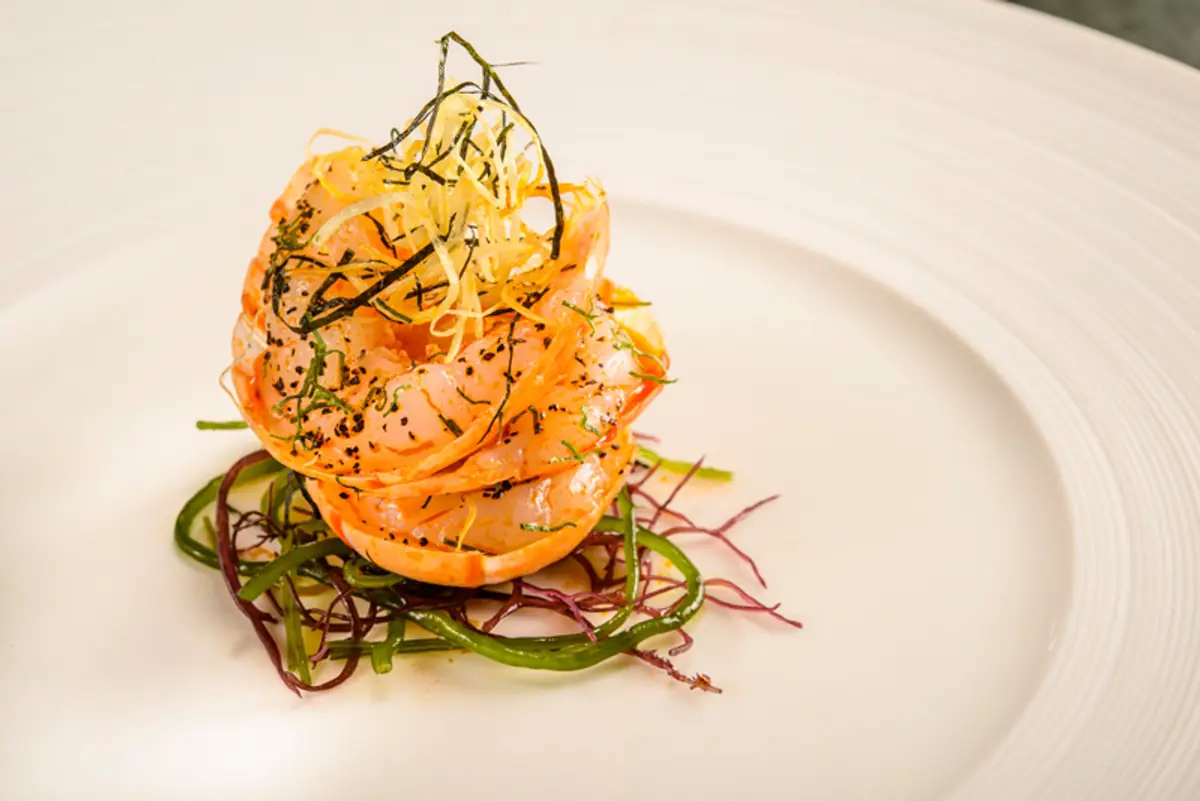 Roasted scampi seasoned with tea at Waku Ghin, Singapore