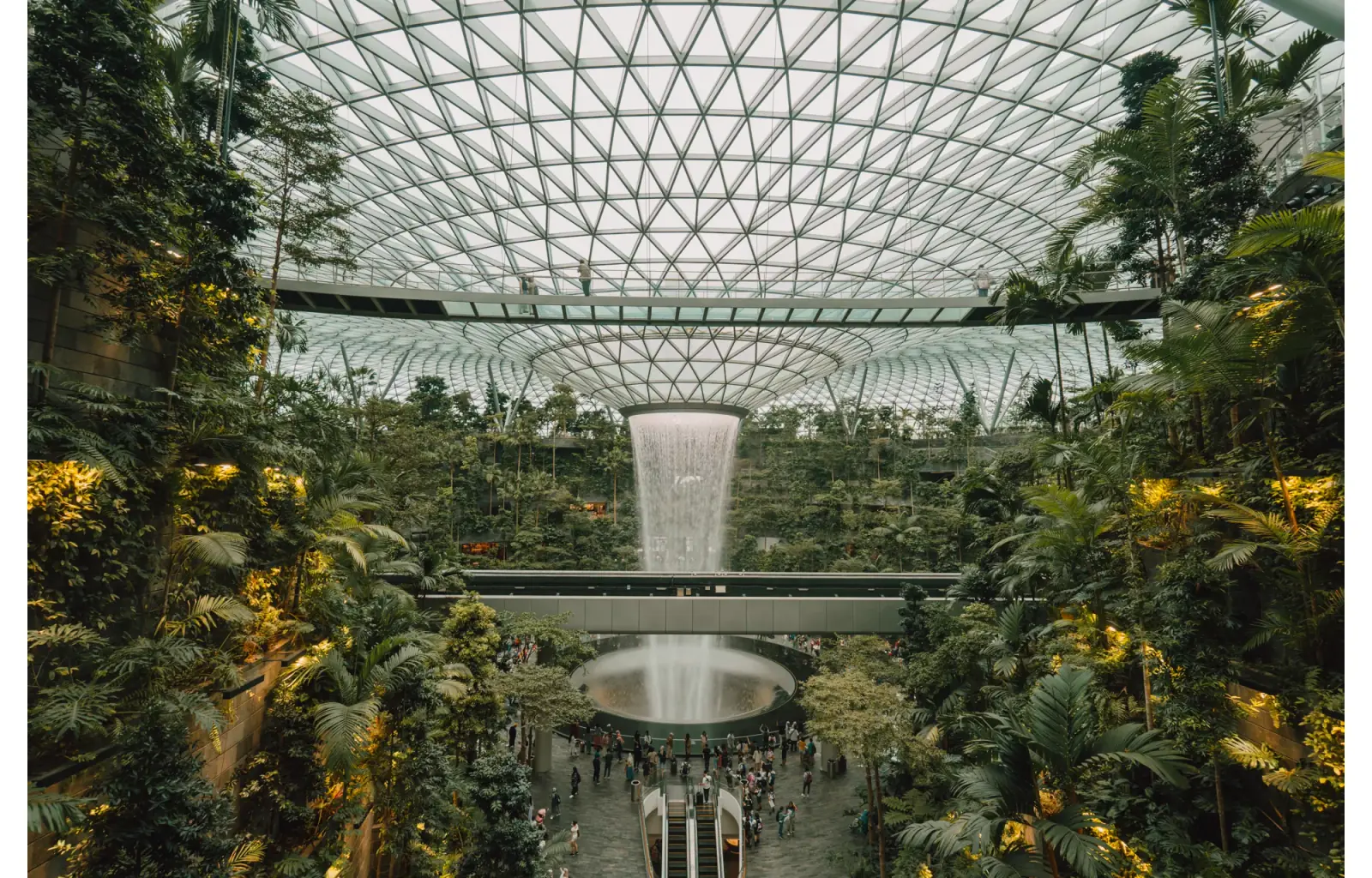 Jewel Changi Airport — The HSBC Rain Vortex indoor waterfall cascading through the Shiseido Forest Valley at Jewel Changi Airport