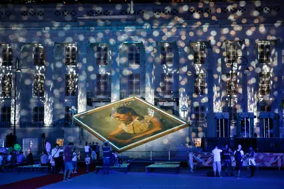 National Gallery Singapore — The facade of National Gallery Singapore lit up for the 'Share the Hope' light and projection show at night