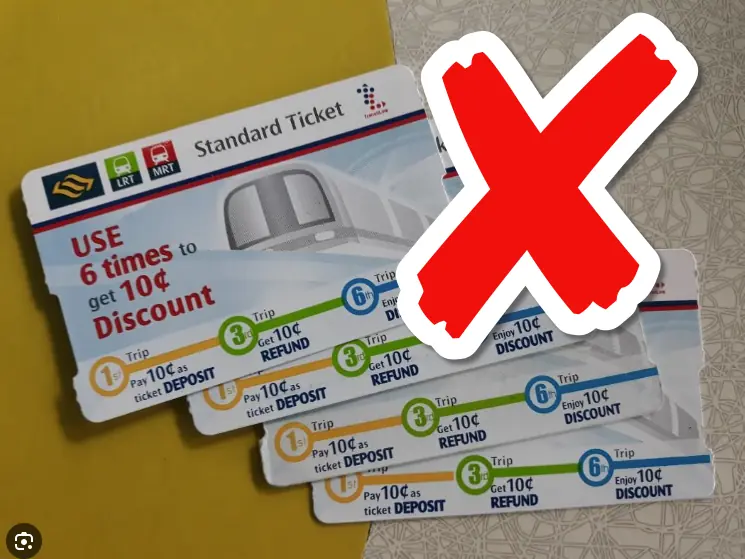 SimplyGo ticket office and top-up kiosks inside a Singapore MRT station